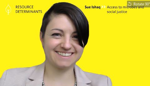 Woman with yellow background in a video meeting.